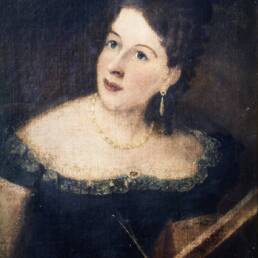 Painting of a brown-haired woman in a black dress and jewels