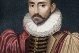 Portrait of a balding man with beard and mustache wearing a frilled neck collar